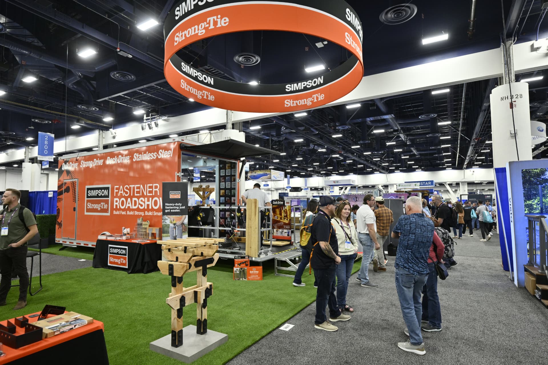 Busy Deck Expo show floor with exhibitor booths and attendees
